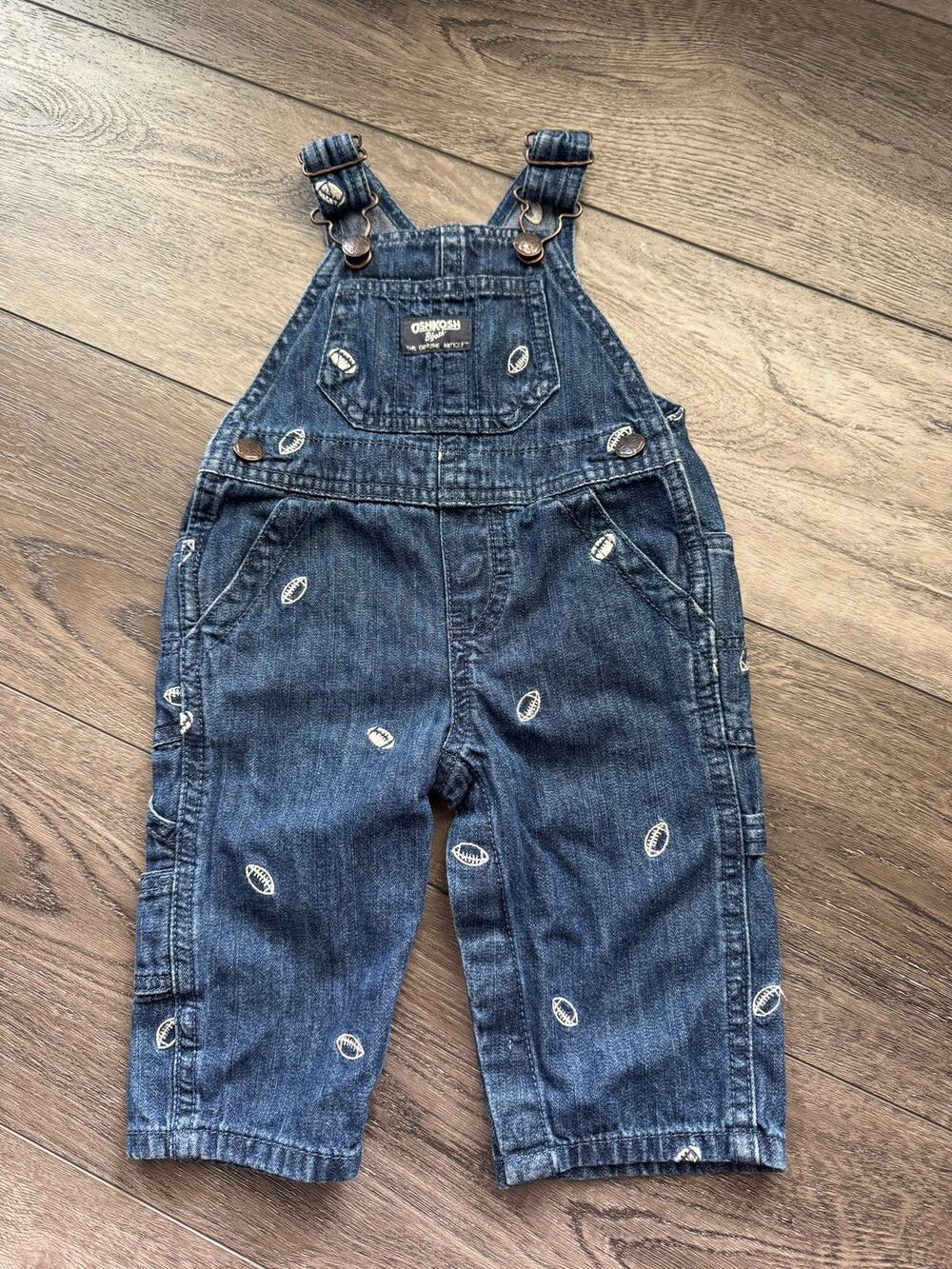 Oshkosh B’gosh Overalls With Footballs Infant Boy’s Size 6 months Blue Denim